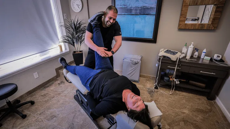 Sports injury treatment and chiropractic adjustment